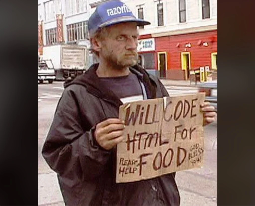 Мужчина с кепкой Razorfish и табличкой WILL CODE HTML FOR FOOD